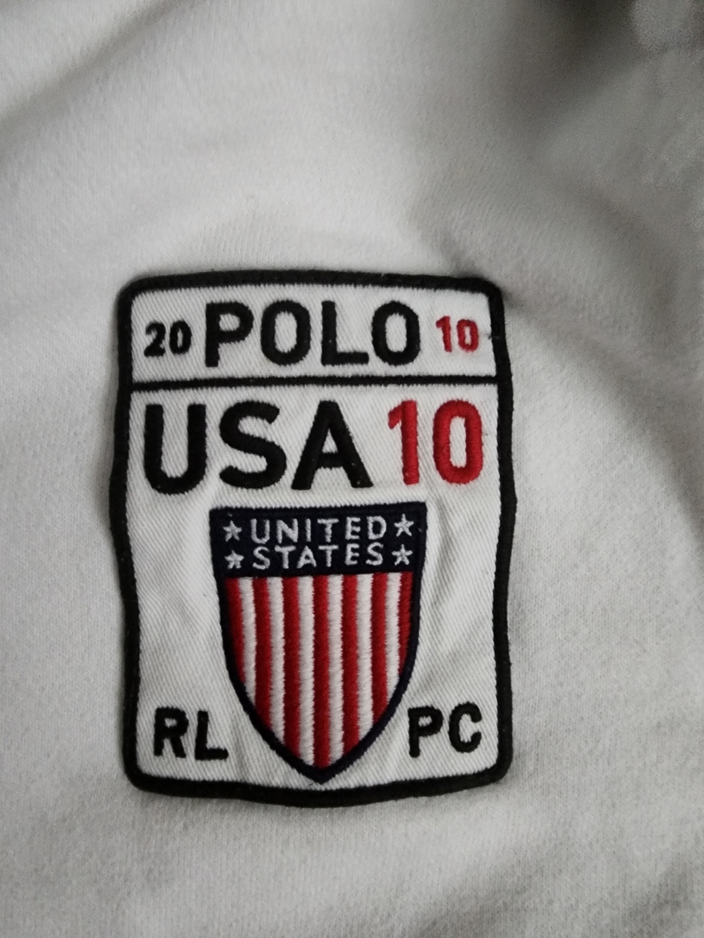Ralph Lauren White Bomber Jacket with Red & Navy USA Shield Patch. S-M